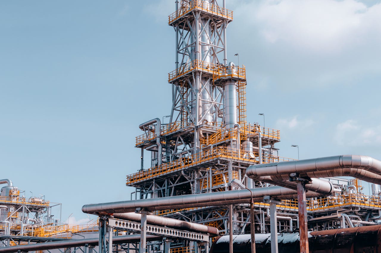 View of a large oil refinery plant with intricate pipelines in Trzebinia, Poland.